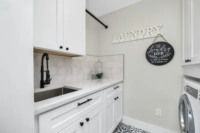 Sink and tiled walls