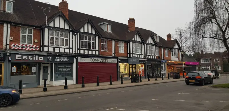 Shops along Dovehouse Parade in Olton